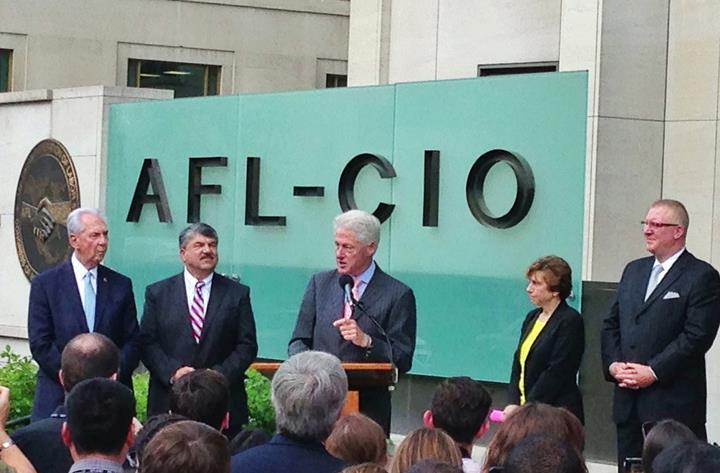Former President Bill Clinton salutes the AFL-CIO for it's green jobs initiatives. Looking on, from left, IBEW Pres. Ed Hill, AFL-CIO Pres. Rich Trumka, AFT Pres. Randi Weingarten and Building Trades Pres. Shawn McGarvey.