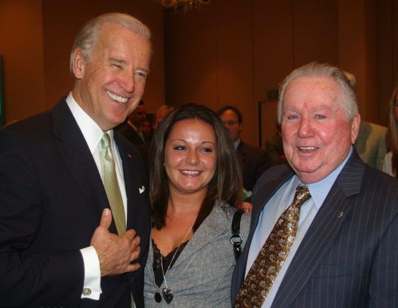 The late ILA President Richard Hughes (right) introduces his granddaughter to Vice President Joe Biden in March 2009.