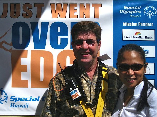 Hawaii PMC Exec S/T Hazel Galbiso (right) congratulates PMC Delegate Gary Aycock after he completed his “walk” down the side of the hotel. The PMC raised $1,367 for the Special Olympics Hawaii. 
