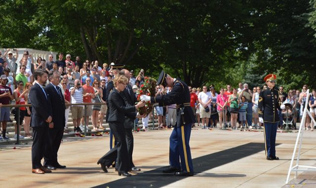 Pam Donato and Eric Packard present “No Greater Love” wreath to Honor Guard at the Tomb of the Unknowns at Arlington Cemetery on Memorial Day. Behind them are Will Fischer and Daniel Duncan.