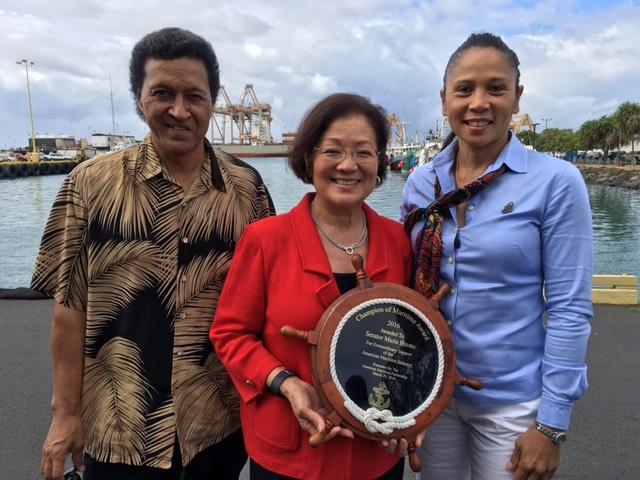 US Sen. Mazie Hirono displays her award with PMC VP Luke Kaili and PMC S/T Hazel Galbiso.