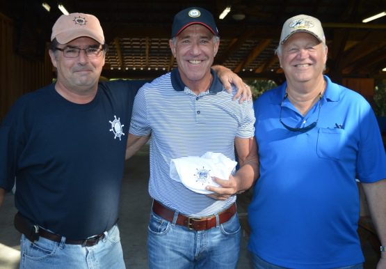 Frank Biden (center), the brother of Vice President Joe Biden, is greeted at the Greater South Florida PMC “Shoot for a Cure” by council VP Kris Hopkins (left) and delegate as well as IBEW Local 728 Business Manager Dave Svetlick.